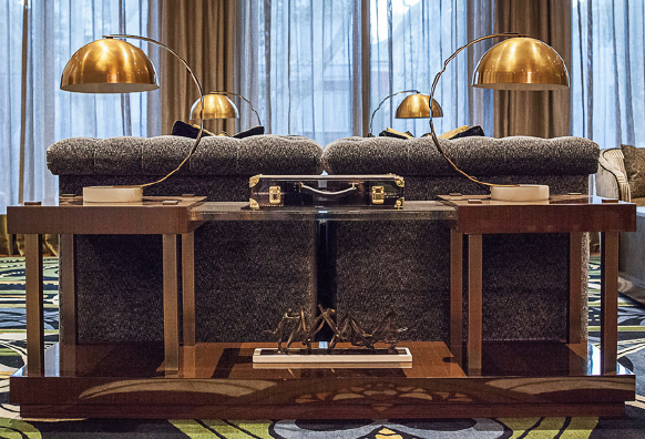 A foursome of Bond Desk Lamps adds a touch of modern with its brass and snow marble.